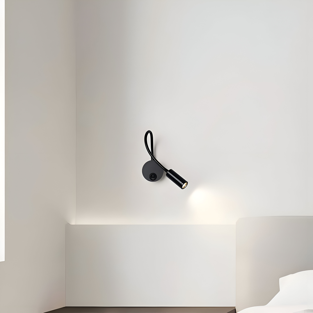 Czarna lampa ścienna LED z regulowanym ramieniem do czytania