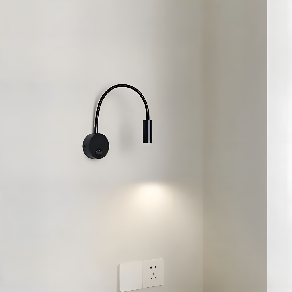 Czarna lampa ścienna LED z regulowanym ramieniem do czytania