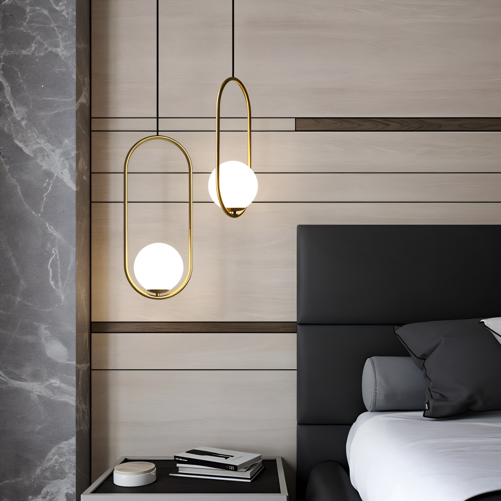 Lampa wisząca złota elipsa LED ze szklaną kulą