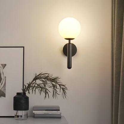 Miedziana lampa ścienna LED z okrągłym kloszem